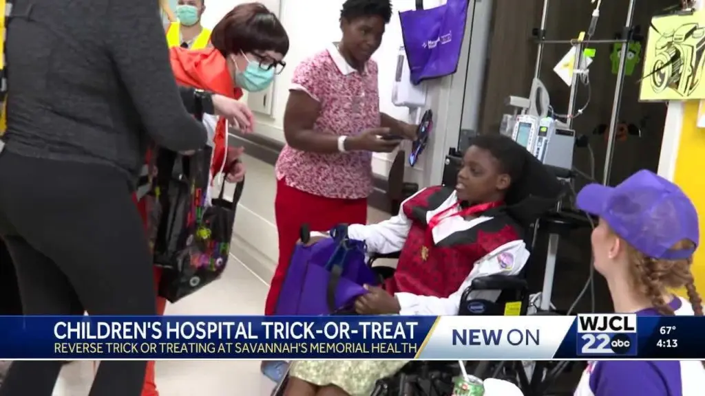 Reverse trick-or-treat parade lights up Memorial Health Children's Hospital