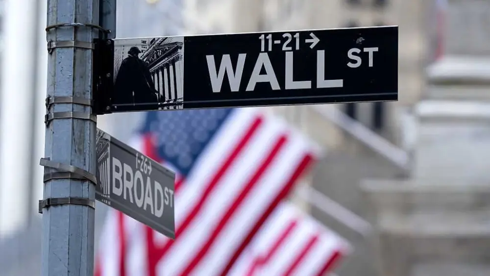 Wall Street shrugs at government shutdown while weak hiring jolts bond market