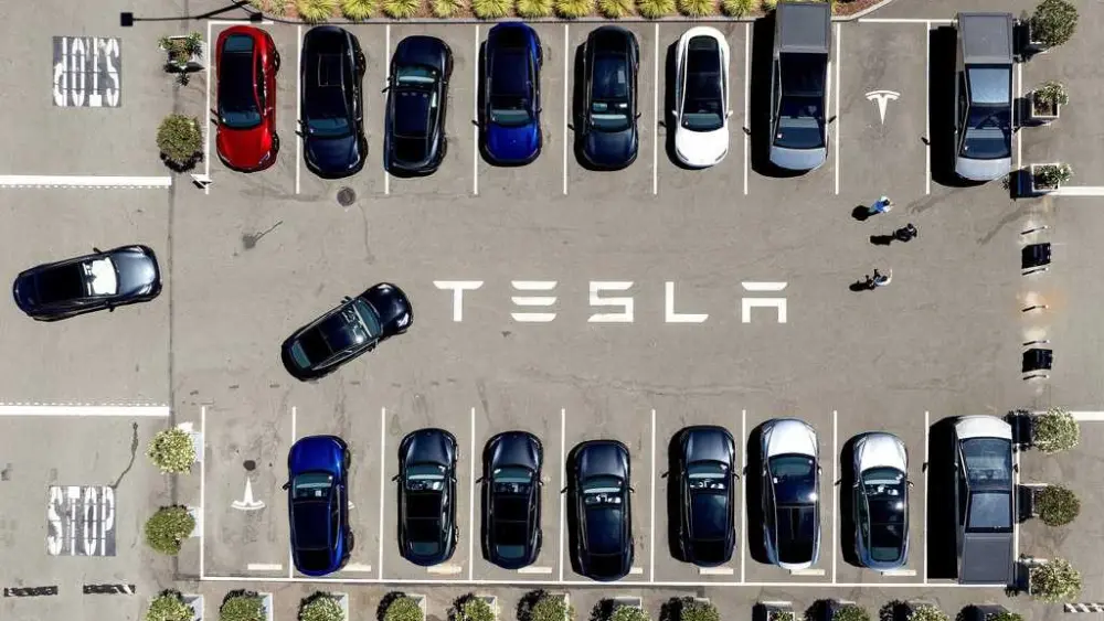 Parents of college student killed in Tesla crash allege design flaw trapped her in the burning car