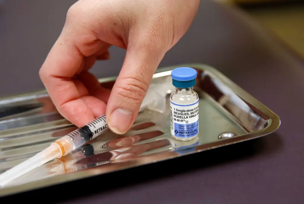 Acting CDC director, citing Trump directive, calls for MMR shot to be split into three