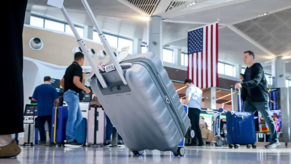 Government shutdown hits air travel, closing a control tower and causing delays across the country
