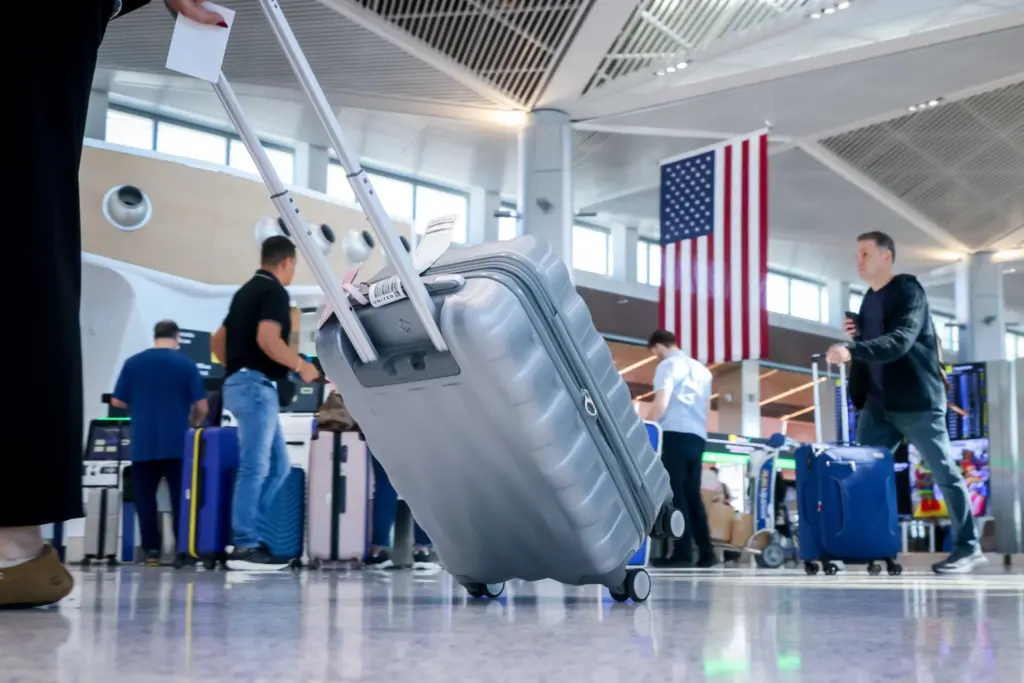 Government shutdown hits air travel, closing a control tower and causing delays across the country