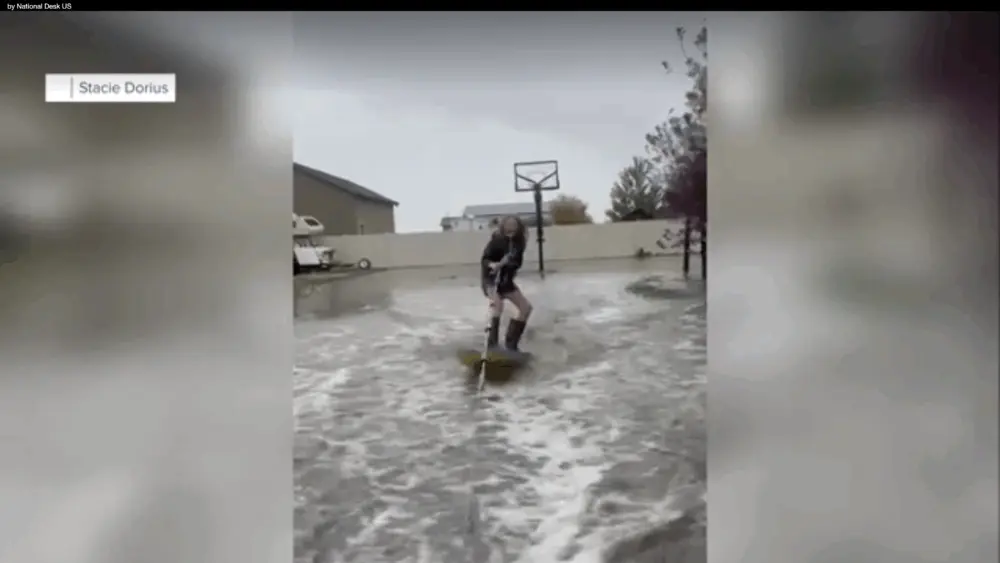VIDEO: Utah family wake surfs in their backyard after record rainfall