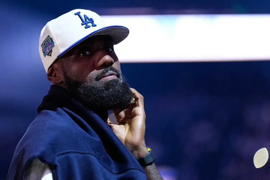 LeBron James will miss opening night of his record 23rd NBA season