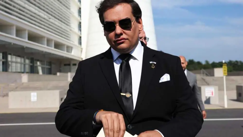 Trump says he has commuted sentence of former US Rep. George Santos in federal fraud case