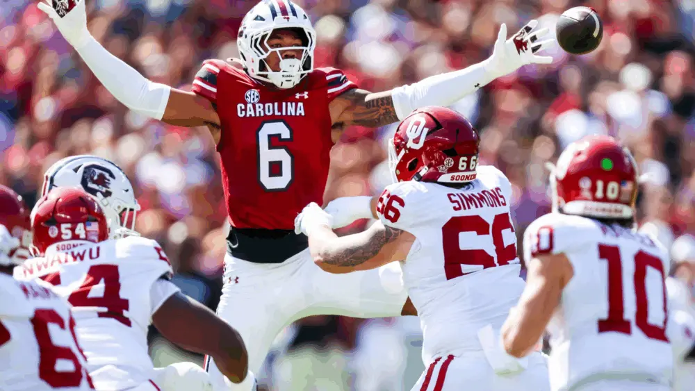 No. 14 Oklahoma sacks Sellers 6 times, stifles South Carolina 26-7