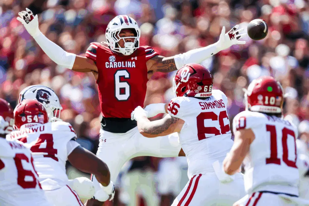 No. 14 Oklahoma sacks Sellers 6 times, stifles South Carolina 26-7