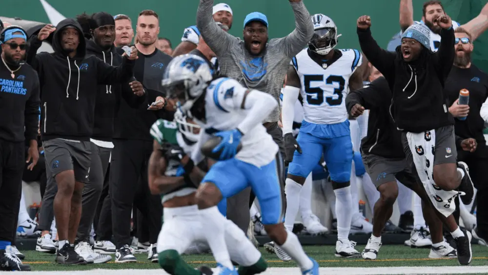 Horn’s 2 INTs, Legette’s TD lift Panthers past winless Jets 13–6, but Young leaves with ankle injury