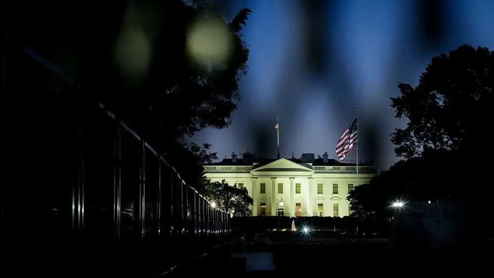 Man taken into custody after driving his car into security gate outside White House, authorities say