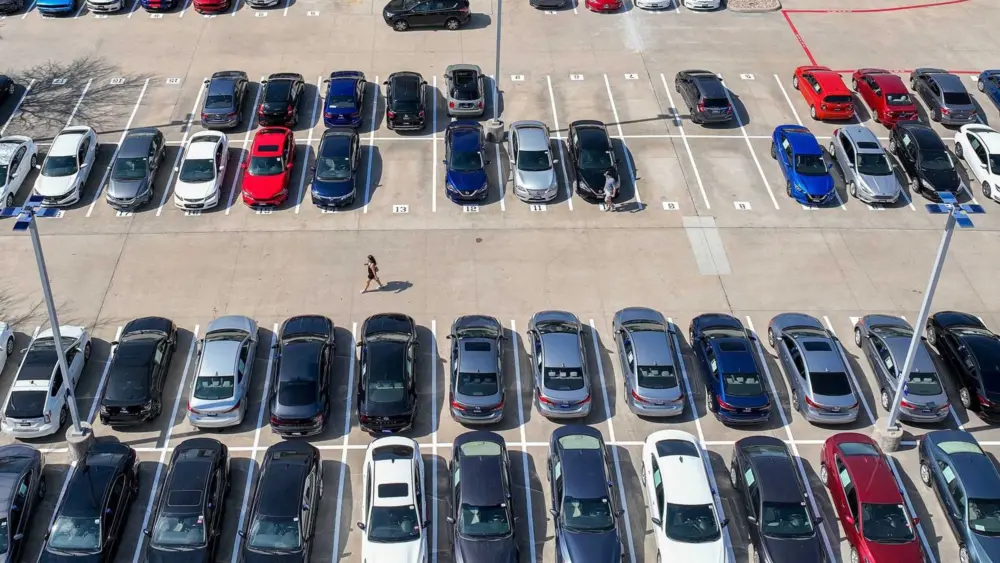 A significant group of Americans are falling behind on their car payments - an economic warning sign