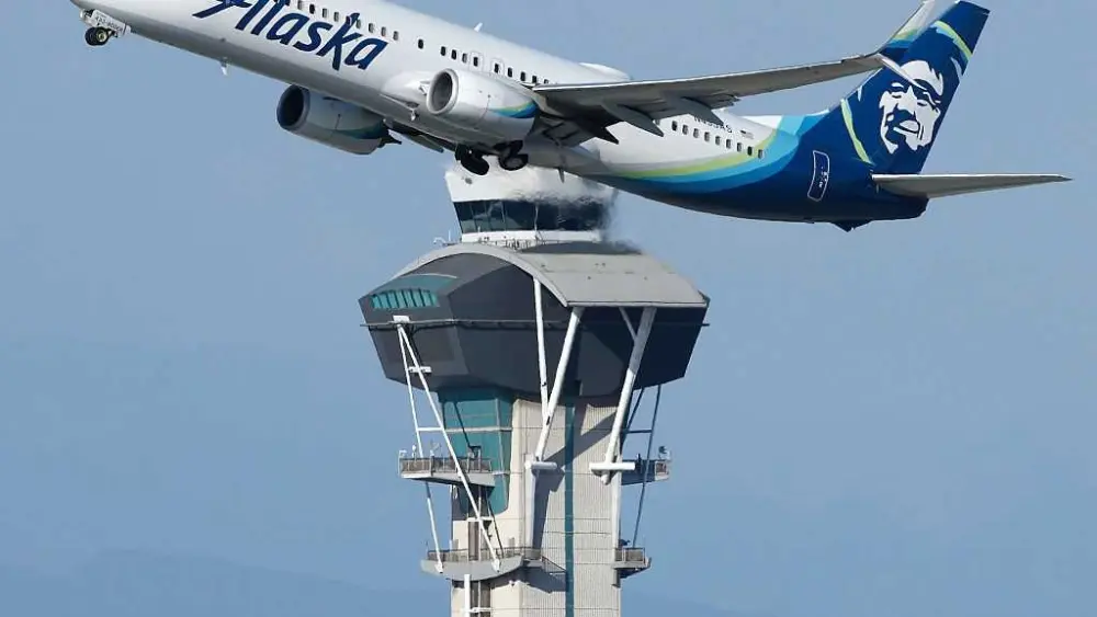 Alaska Airlines says an information technology outage is grounding its flights