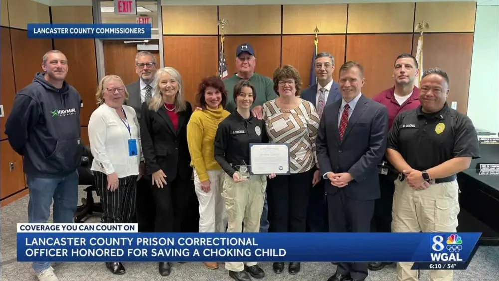 Correctional officer honored for saving choking child