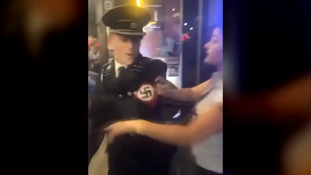 Viral video shows Georgia man in Nazi uniform hitting woman outside bar