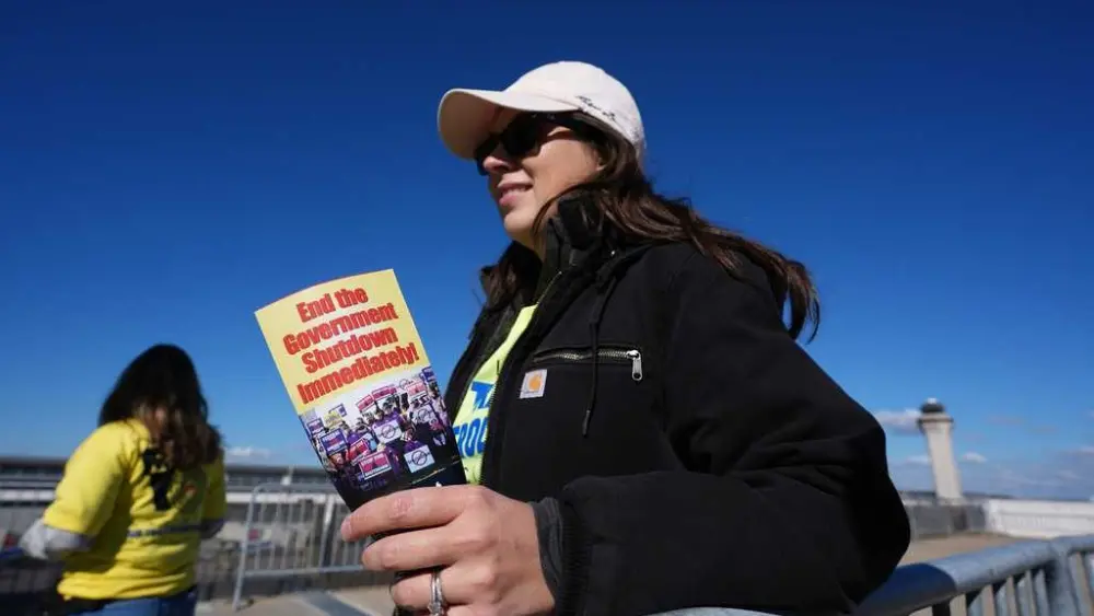 Judge extends order barring the Trump administration from firing federal workers during the shutdown