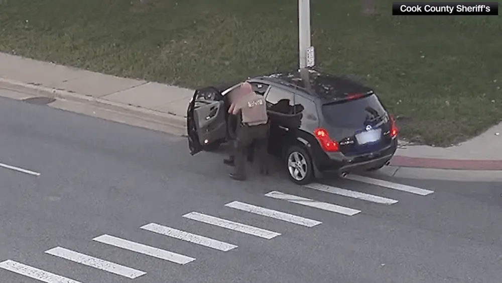 Video: Officer saves woman who began choking while driving