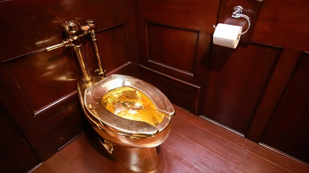 How much would you pay for an infamous gold toilet?