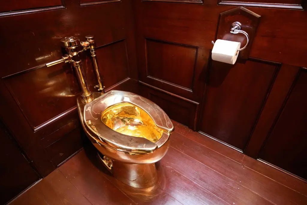 How much would you pay for an infamous gold toilet?