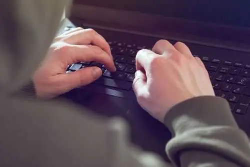 2 men accused of hacking and extorting US companies previously worked for cybersecurity firms