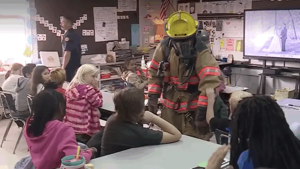 Third graders praised for spotting house fire, helping save dog
