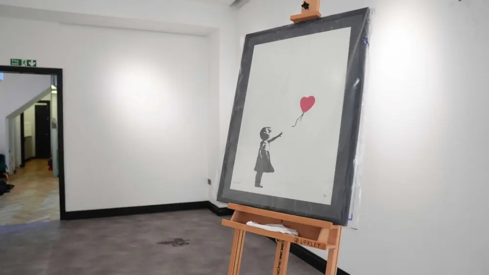 Man jailed for stealing Banksy's 'Girl with Balloon' print in smash-and-grab London robbery