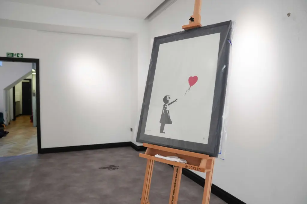 Man jailed for stealing Banksy's 'Girl with Balloon' print in smash-and-grab London robbery