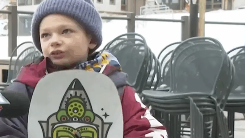 7-year-old snowboarder aims for sixth 100-day season