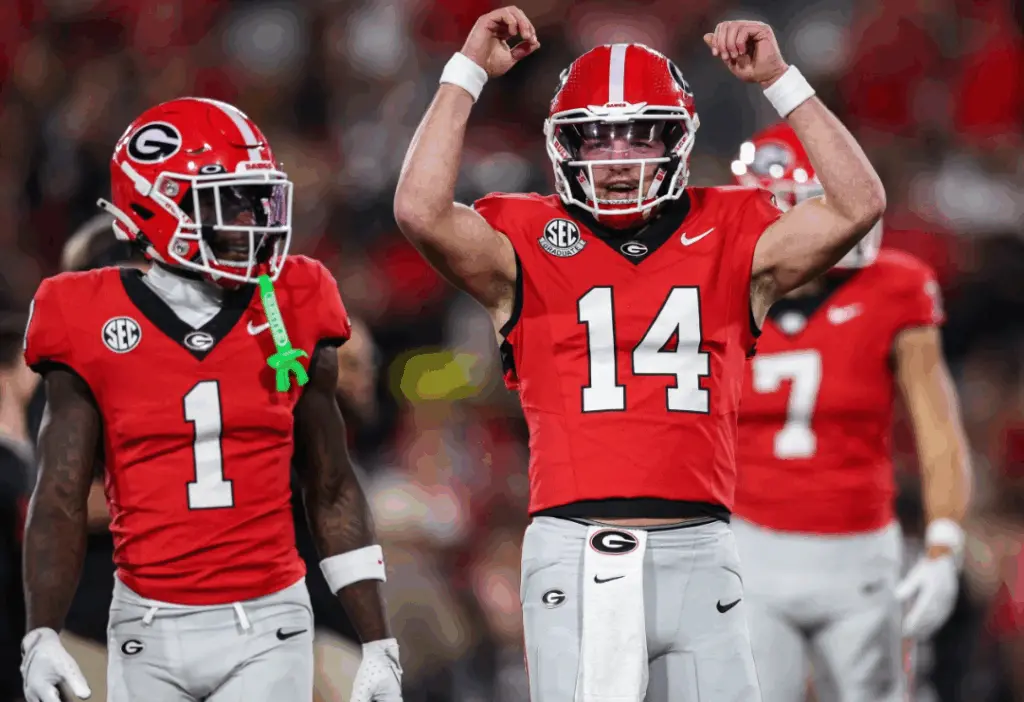 Stockton accounts for 5 touchdowns to outshine Manning as No. 5 Georgia beats No. 10 Texas 35-10