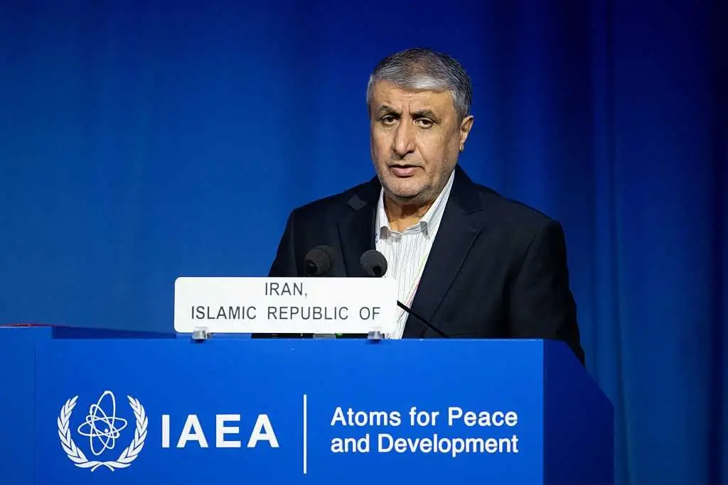 Iran's foreign minister says the nation is no longer enriching uranium at any site