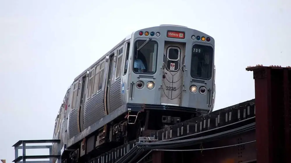 Man sets fire to a woman on a Chicago L train before fleeing, police say