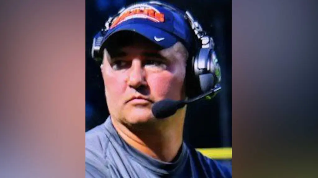 Missing Virginia football coach is wanted on child pornography and other charges, police say