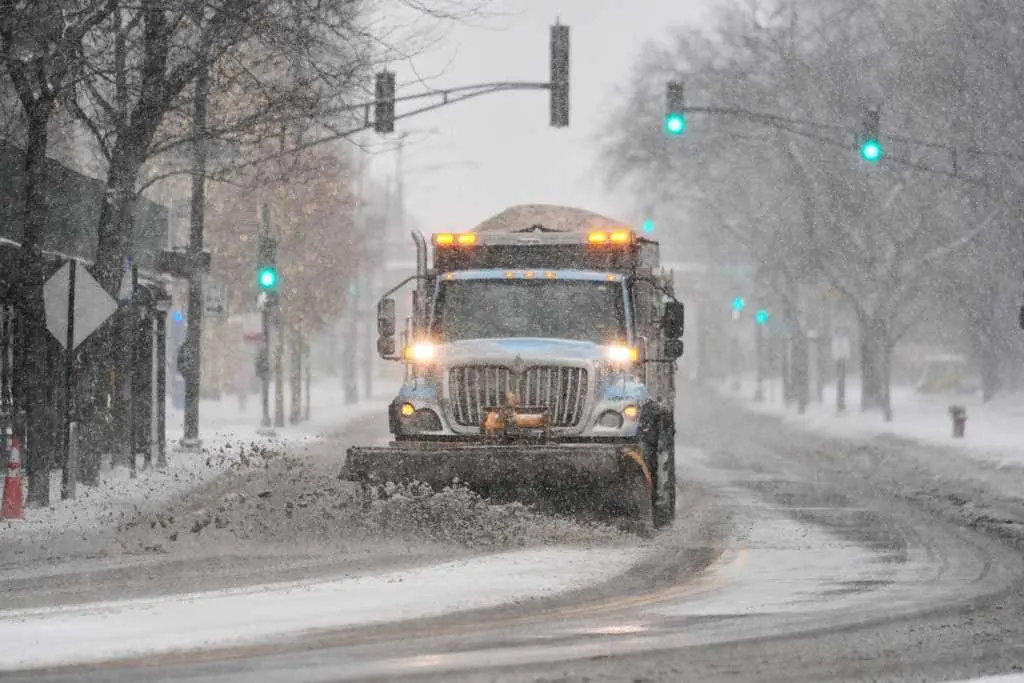 Winter storms bring snow, freezing rain and cold as Thanksgiving travelers journey home
