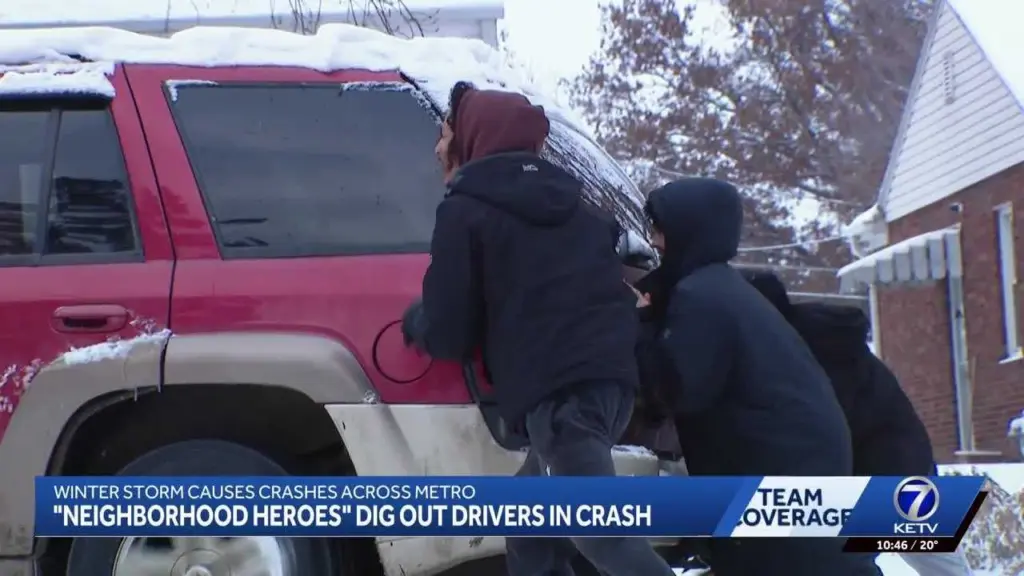 'Neighborhood heroes' push cars out of icy Omaha pileup