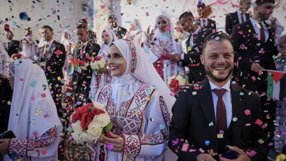 Mass wedding in Gaza celebrates new life after years of war and tragedy