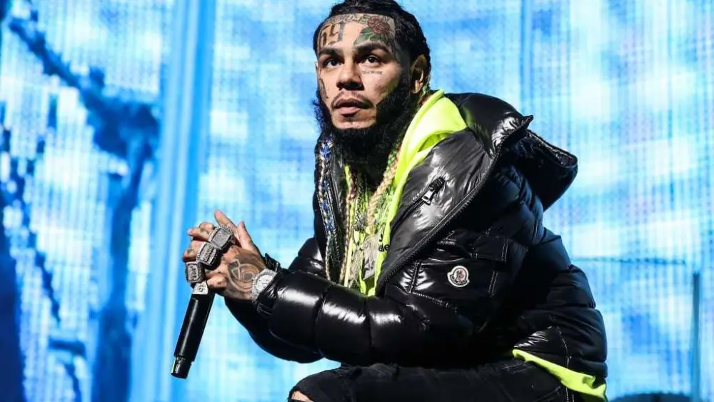 Rapper Tekashi 6ix9ine gets 3 months in prison for violating probation in gang case