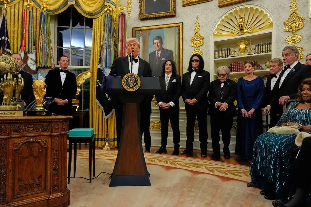 Trump awards medals to the Kennedy Center honorees in an Oval Office ceremony