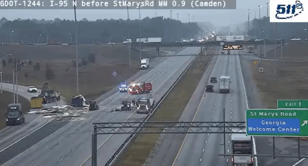 Overturned tractor-trailer shuts down lanes on I-95