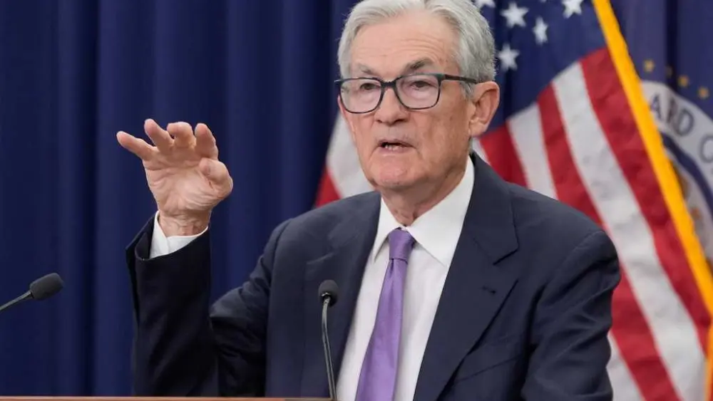 Federal Reserve cuts key rate but signals higher bar for future reductions