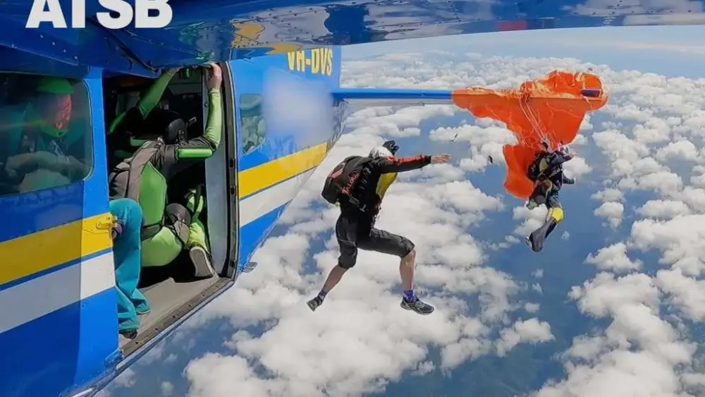 Dramatic video shows moment a skydiver's parachute gets caught on plane's tail