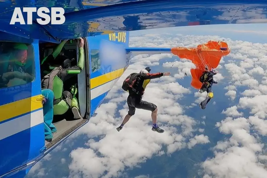 Dramatic video shows moment a skydiver's parachute gets caught on plane's tail