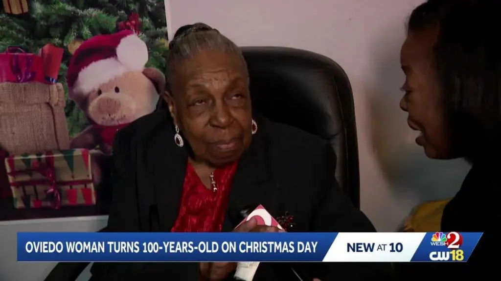 A woman turning 100 on Christmas day celebrates with a party at church
