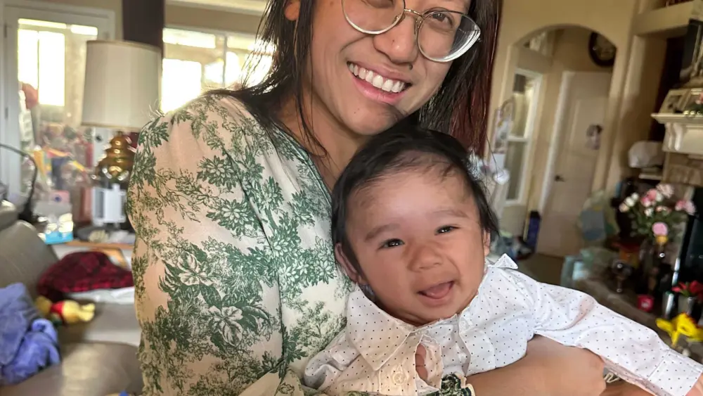 'The best gift ever': Baby is born after the rarest of pregnancies, defying all odds