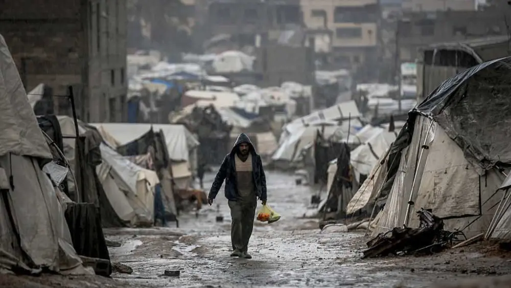Winter rain floods Gaza camps as Netanyahu heads for US meeting