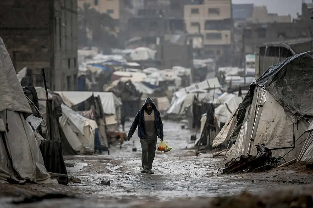 Winter rain floods Gaza camps as Netanyahu heads for US meeting