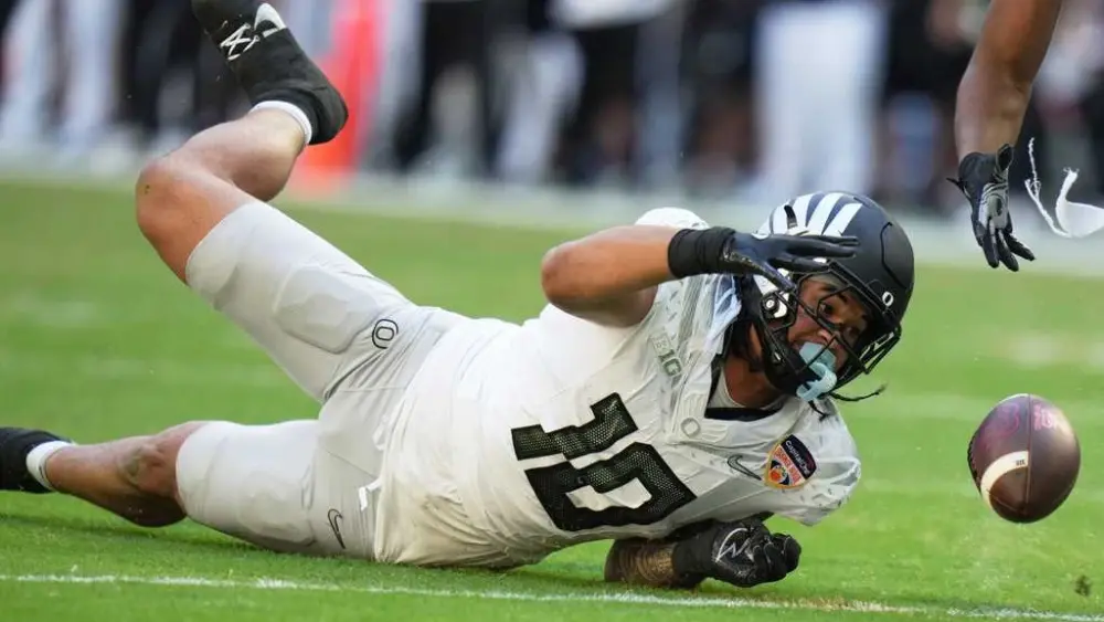 Defense carries the day for Oregon, as Ducks move into CFP semifinals by topping Texas Tech 23-0