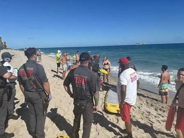WATCH: Paraglider falls into ocean, saved by lifeguards