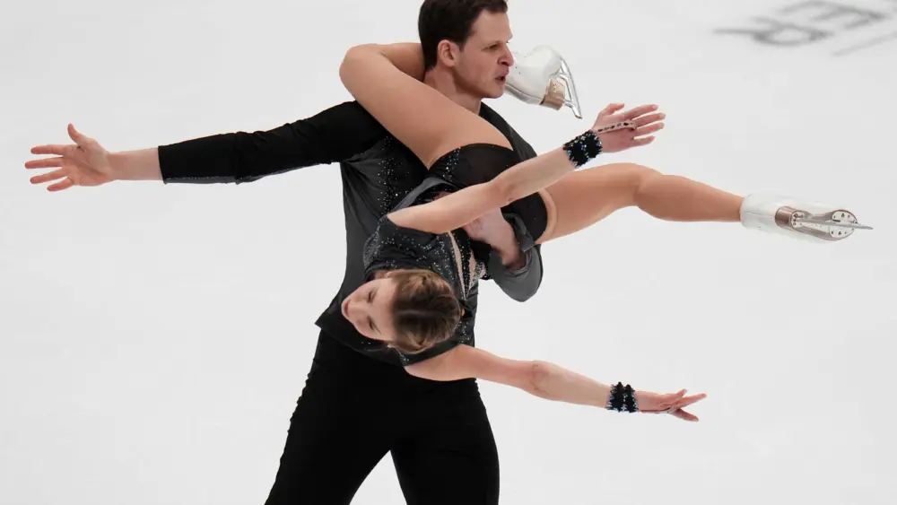 Skating pair took title at US nationals but can't compete in Olympics after passport delay