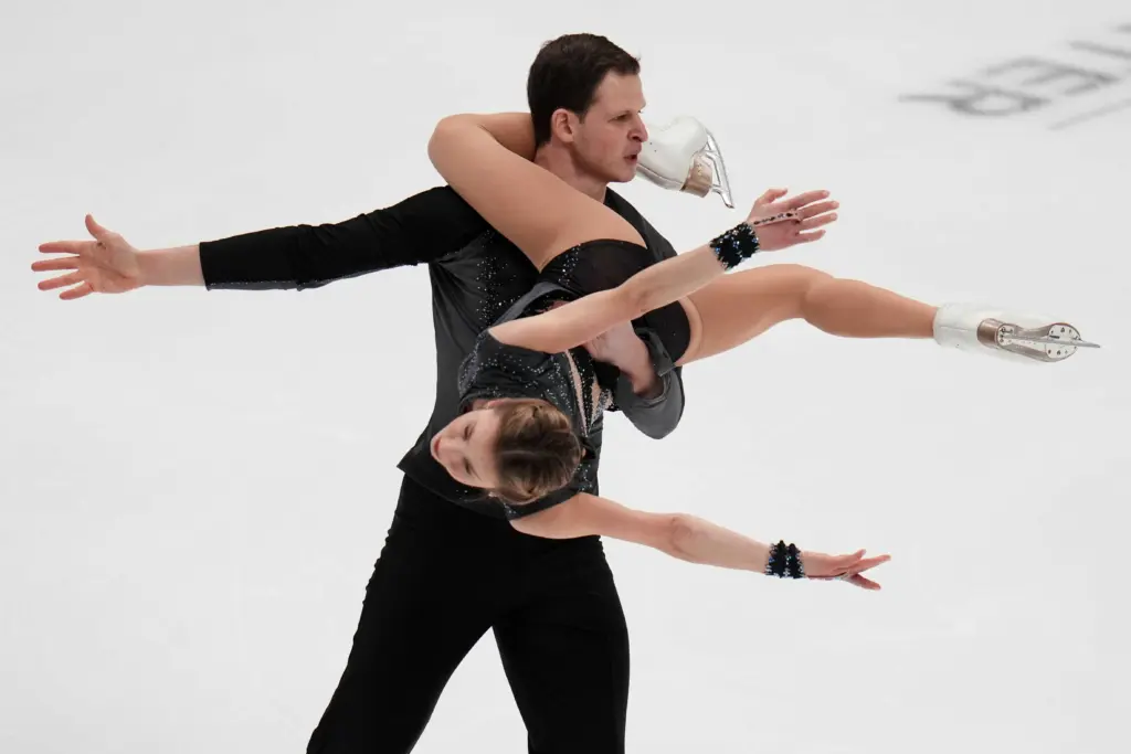 Skating pair took title at US nationals but can't compete in Olympics after passport delay