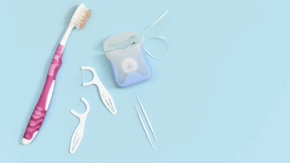 Should You Floss or Brush First? Here's What Dentists Recommend