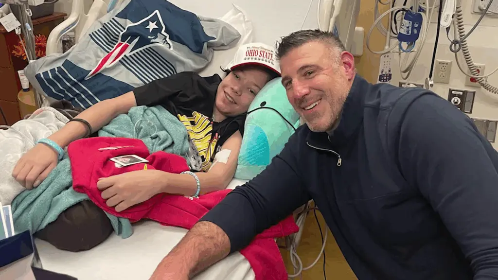Patriots coach visits young patient during sickle cell treatment
