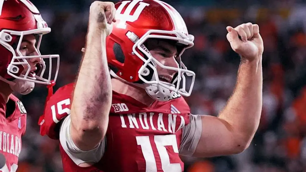 Indiana completes undefeated season and wins first national title, beating Miami in CFP final